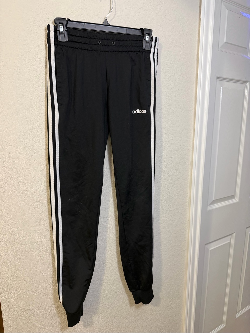 adidas women’s Black Track Pants with White Stripes